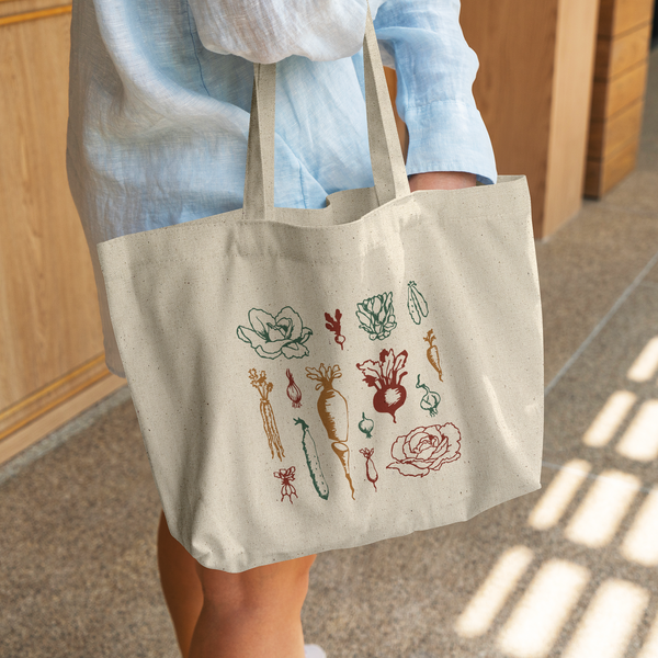 Veggie_Market_Tote_CottonTote_L_WomanDigging_Mockup.png